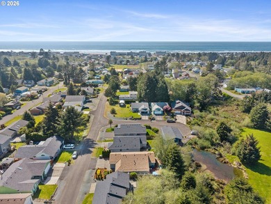 Rockaway Beach home on quiet street backs up to a pond to take - photo 32