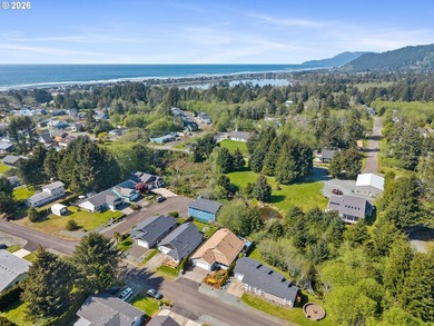 Rockaway Beach home on quiet street backs up to a pond to take - photo 33
