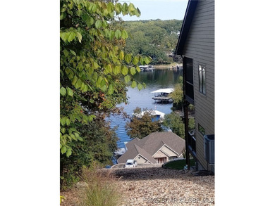 Check out this hard-to-find available lake view building site in - photo 3
