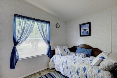 Welcome to this well-maintained east-facing home featuring an - photo 12