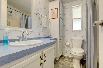 Welcome to this well-maintained east-facing home featuring an - photo 13