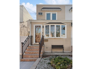 Welcome to this charming semi-attached home nestled in the - photo 1
