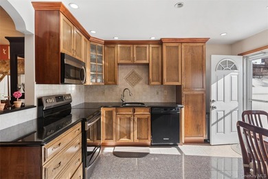 Welcome to this charming semi-attached home nestled in the - photo 8
