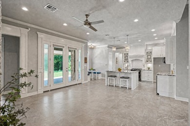 A serene lakefront retreat in private Tuscany Lake Estates, this - photo 9