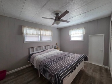 This 2 bed 1.5 bath home is located in Teakwood Village a 55+ - photo 11