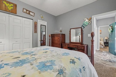 This updated second-floor, 3-bedroom, 2-bath condo overlooks the - photo 12