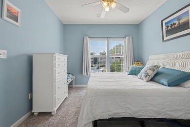 This updated second-floor, 3-bedroom, 2-bath condo overlooks the - photo 18