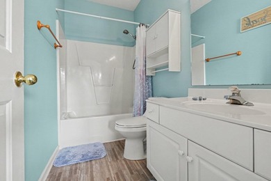 This updated second-floor, 3-bedroom, 2-bath condo overlooks the - photo 20