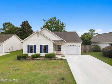 Welcome to this well-maintained 3-bedroom, 2-bath home in the - photo 2