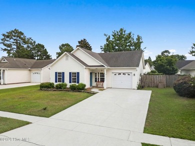 Welcome to this well-maintained 3-bedroom, 2-bath home in the - photo 3