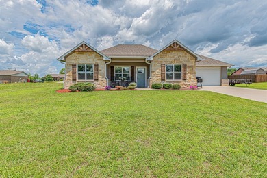 Single story charmer located on a large .35 lot with no HOA. The - photo 1