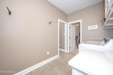 WELCOME TO YOUR DREAM HOME IN OCEAN SPRINGS, MISSISSIPPI! This - photo 41