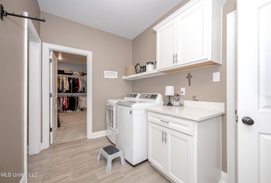 WELCOME TO YOUR DREAM HOME IN OCEAN SPRINGS, MISSISSIPPI! This - photo 42