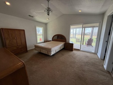 Escape to the Ozarks with this charming 3-bed, 2-bath vacation - photo 13