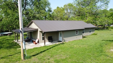 Escape to the Ozarks with this charming 3-bed, 2-bath vacation - photo 34