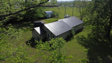 Escape to the Ozarks with this charming 3-bed, 2-bath vacation - photo 37