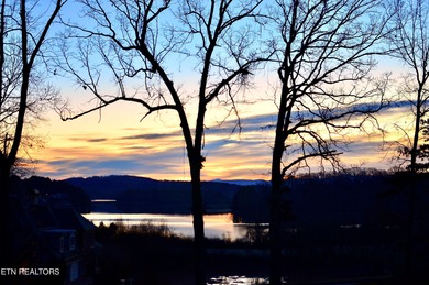 LAKE & MOUNTAIN VIEWS on large lot (.75 acres). Beautiful