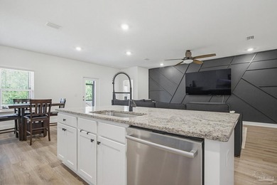 This stunning 4-bedroom, 2-bath home offers like-new - photo 7