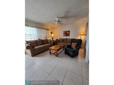 Lake Condo For Sale in Deerfield Beach, Florida