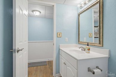 Located in the highly desirable Edgewater Beach & Golf Resort in - photo 7