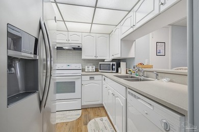 Located in the highly desirable Edgewater Beach & Golf Resort in - photo 10