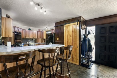 Priced below recent appraisal! Located down the highly desirable - photo 5