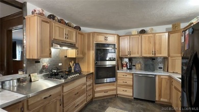 Priced below recent appraisal! Located down the highly desirable - photo 6