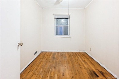 Welcome to 2125 Homer Avenue, a well maintained two-family brick - photo 11