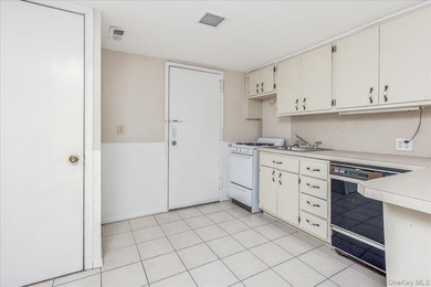 Welcome to 2125 Homer Avenue, a well maintained two-family brick - photo 15