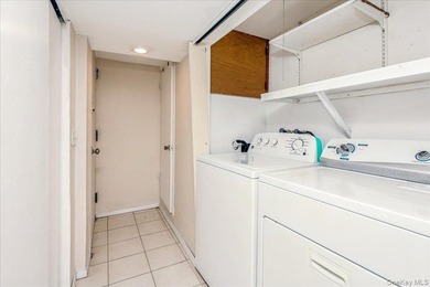 Welcome to 2125 Homer Avenue, a well maintained two-family brick - photo 18