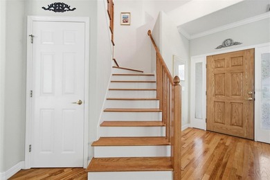 Tucked beneath a canopy of mature trees in the gated community - photo 21