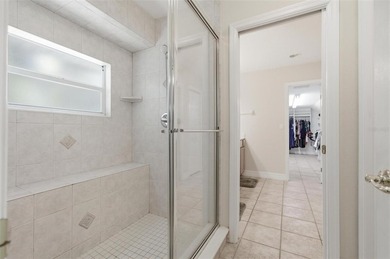 Tucked beneath a canopy of mature trees in the gated community - photo 25