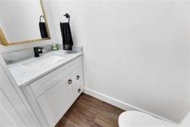 THIS STUNNING GROUND FLOOR UNIT HAS BEEN TOTALLY RENOVATED IN