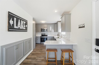 Wake up to breathtaking waterfront views in this beautifully - photo 15