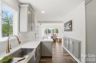 Wake up to breathtaking waterfront views in this beautifully - photo 16
