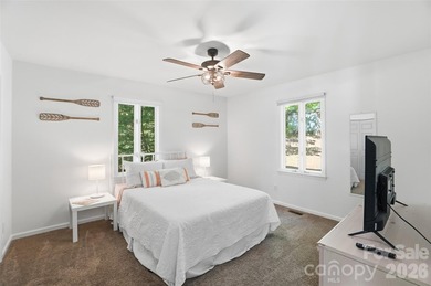 Wake up to breathtaking waterfront views in this beautifully - photo 22