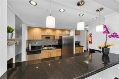 THIS STUNNING GROUND FLOOR UNIT HAS BEEN TOTALLY RENOVATED IN