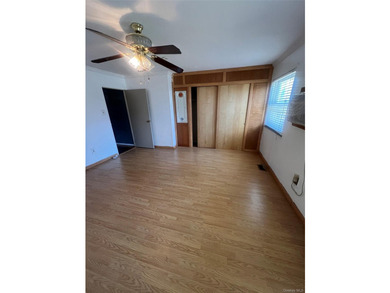 Located on a peaceful, tree-lined street in the Brownville - photo 3