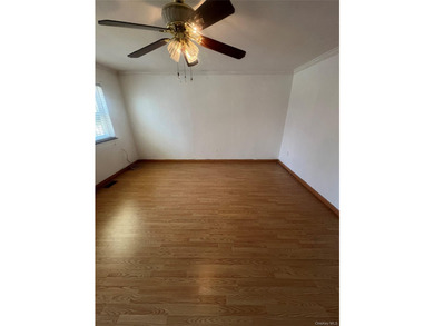 Located on a peaceful, tree-lined street in the Brownville - photo 4