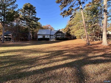 Discover your dream lakefront retreat nestled on the shores of - photo 8