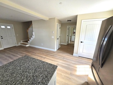 This charming two-story Cape-style duplex condo features an open - photo 12