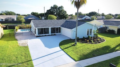 Welcome home. This thoughtfully renovated block pool home rests - photo 1