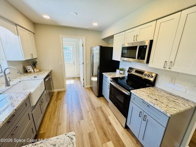 Welcome home. This thoughtfully renovated block pool home rests - photo 9