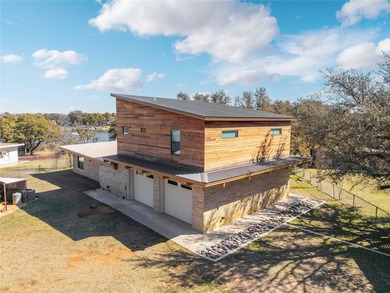 $50,000 price drop! Set on a prime stretch of Lake Brownwood is - photo 2