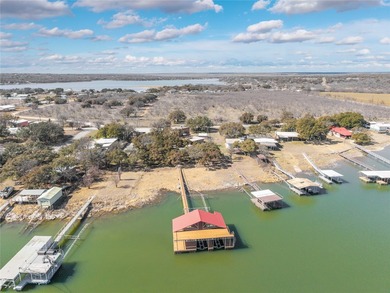 $50,000 price drop! Set on a prime stretch of Lake Brownwood is - photo 3