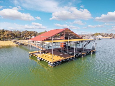 $50,000 price drop! Set on a prime stretch of Lake Brownwood is - photo 4