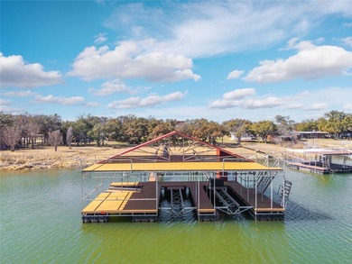 $50,000 price drop! Set on a prime stretch of Lake Brownwood is - photo 5