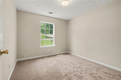 Welcome home to this inviting 3-bedroom, 2-bath ranch nestled in - photo 12