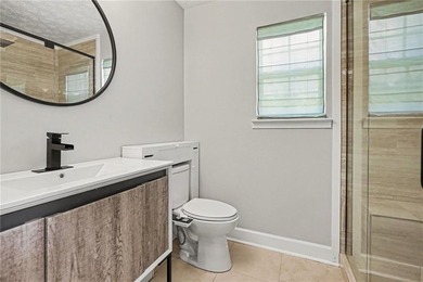 Welcome home to this inviting 3-bedroom, 2-bath ranch nestled in - photo 17