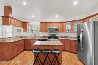 Welcome to this beautifully maintained 4-bdrm, 3-bath home - photo 7